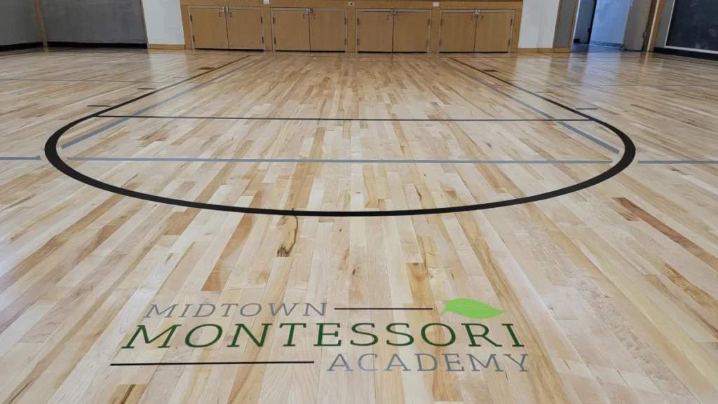 Maple gym floor Sanded repainted and finished